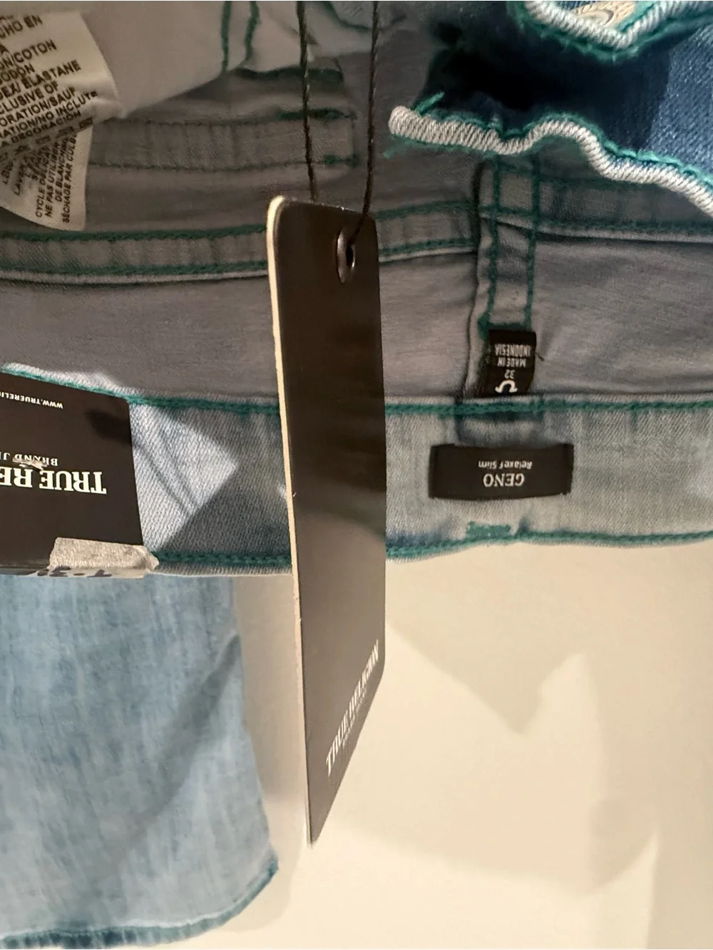 True Religion Light Wash Jeans with Green Back Pocket Accents